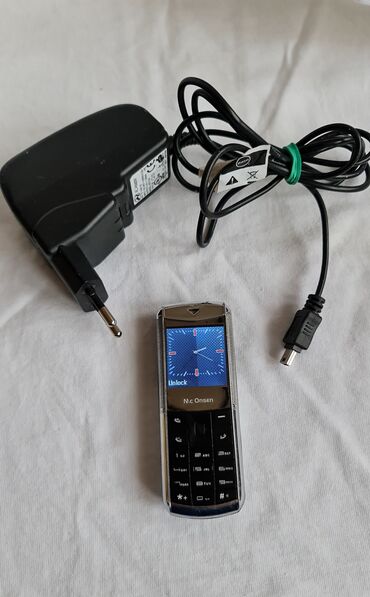 Ostali mobilni telefoni: Mc Onsen mobilni telefon sa punjačem - Model: Mc Onsen klasični — 1