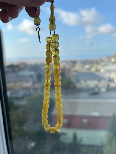 Gaya damla kaliningrad.12 gram gümüş püsküllü.orjinal kəhrəba.Kəhrəba