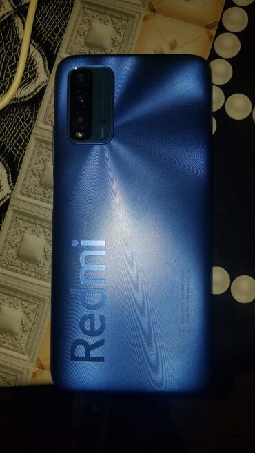 Xiaomi: Xiaomi Redmi 9T, 128 ГБ, цвет - Голубой, 
 Кнопочный, Сенсорный, Отпечаток пальца