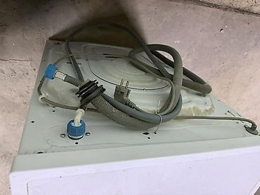 Бытовая техника: Стиральная машина Midea MFE60‑S1008 (фронтальная загрузка) - — 5