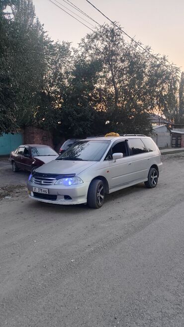 меняю на дом: Продается минивэн Honda Odyssey серебристого цвета, оснащенный