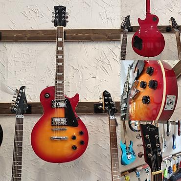 Гитары: Elektro-gitara Smiger L-G9 Simlərin sayı: 6 Üst: Ağcaqayın Qol: Gül — 1