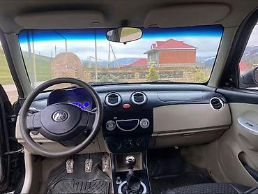 LIFAN: Lifan 320, 5 qapılı kompakt hetçbek. Xarici: - Qara rəng, xrom qapı — 3