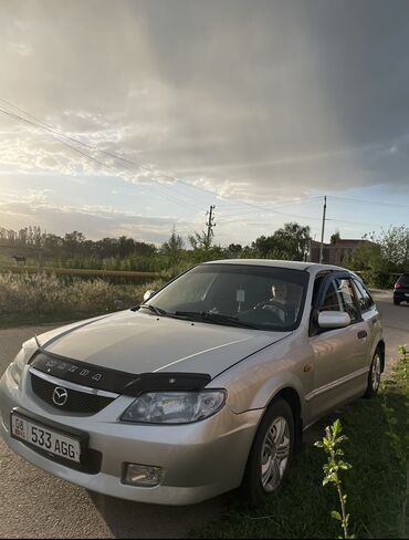 кочкор машина: Mazda Familia: 2003 г., Механика, Хетчбек