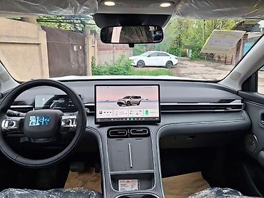 byd e1: На заказ GAC AION i60 от 2026 г. максимальная комплектация. Электро + — 5