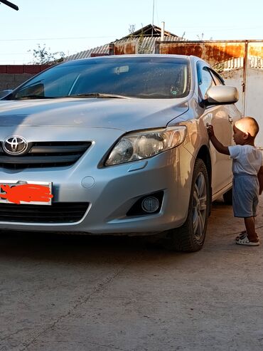 фара камри 70 оригинал: Toyota Corolla: 2010 г., Седан