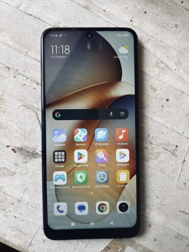 телефон редим 10: Смартфон Xiaomi Redmi Note 12 в черном цвете, оснащенный операционной