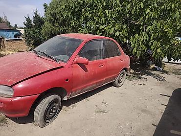 американский номер: Mazda 121: 1991 г., 1.3 л, Механика, Бензин, Седан — 2