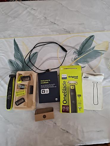 samsung s3550 shark slider: Philips OneBlade ülgüc və trimmer dəsti Xüsusiyyətlər: - Model — 4