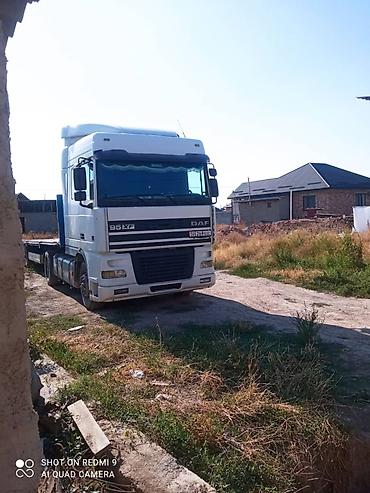 даф 2012: Тягач DAF 95XF с платформенным полуприцепом KRONE - Назначение — 2