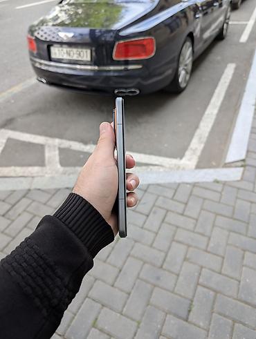 black shark 3pro: Xiaomi 14 Pro, 1 TB, rəng - Boz, 
 Barmaq izi, Simsiz şarj, İki sim kartlı — 6
