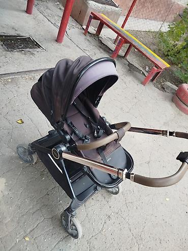 коляска ilovi: Прогулочная коляска Kidilo (надпись на сиденье) с поворотным блоком — 1