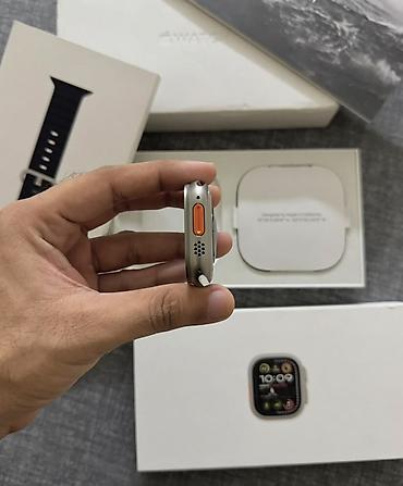 apple watch ultra 1: Apple Watch Ultra (49 mm) – Titan korpus, Ocean Band üslubunda qara — 4