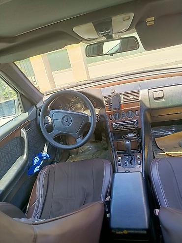 e39 guzgu: Mercedes-Benz C-Sinif sedan (W202). Rəng: boz. Kuzov 4 qapılı, klassik — 7