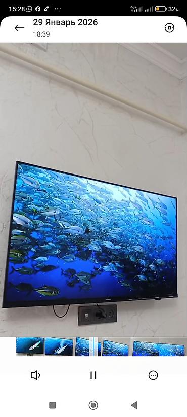 Телевизоры: Телевизор KIVI (надпись на рамке) с тонкими рамками, настенное — 4