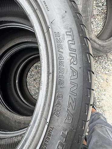 балон каток: Летние шины Bridgestone Turanza T001 - Размер: 235/45 R18 - Индекс — 2