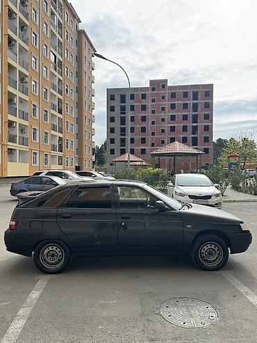 VAZ (LADA): Model: Lada 2112 (hatchback, 5 qapı) Rəng: qara (mat) Yanacaq: benzin — 7