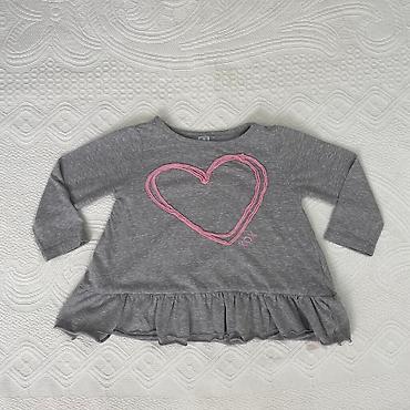tn kids: Bluza-tunika za bebe
Nije puno nosena,u ok stanju
Velicina 12 mes — 5