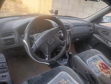 мини электро: Mazda Capella: 1999 г., 2 л, Механика, Бензин, Универсал — 3