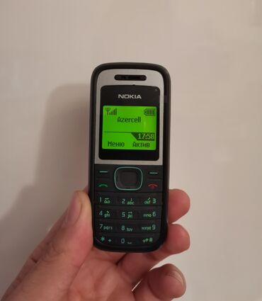 nokia 1200: Nokia 1200 telefon işlək vəziyyətdədir Qeydiyyatdan keçib adaptor var