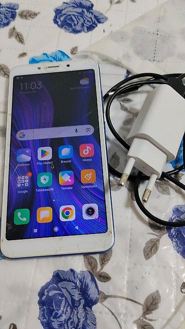 telefon naftalan: Redmi 32 GB, rəng - Göy, Barmaq izi — 1