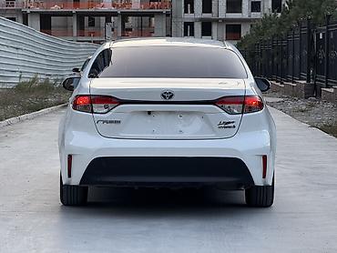 100: Toyota Corolla: 2023 г., 1.8 л, Автомат, Гибрид, Седан — 5