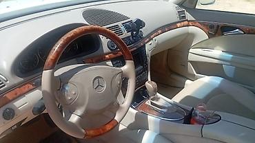 passat 2004: Mercedes-Benz E 320: 3.2 l | 2004 il Sedan — 4