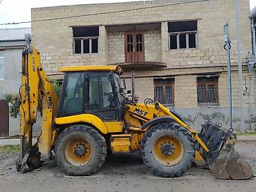 mtz 82 4x4: MST ekskavator-yükləyici (backhoe loader) - Marka/model: MST M5 — 2