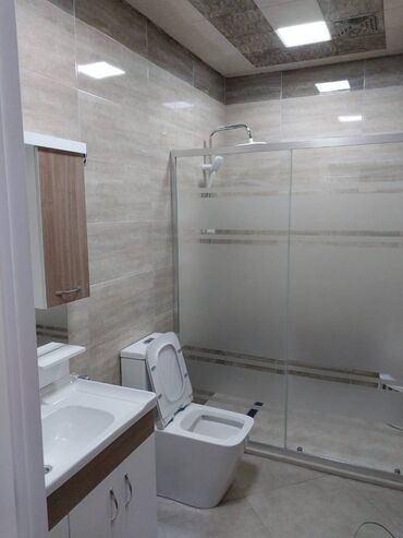 Uzunmüddətli kirayə mənzillər: Qaraev metrosuna yaxin 10 mertebeli binanın 1-ci mərtəbəsində yerləşən — 18