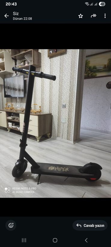 kimya qayda kitabi pdf 2023: HIPER markalı qara rəngli elektrik skuter. Bu skuter istifadəçi üçün