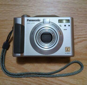 Фотоаппараты: Panasonic Lumix dmc-lc33 Adapteri yoxdur. Açılanda "System error"