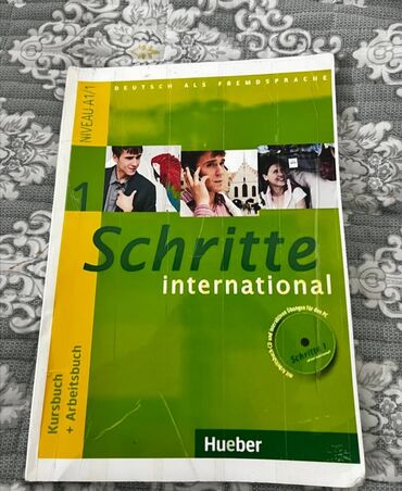 Иностранные языки: Продаю книгу. Schritte. 1 часть. состояние : идеальное . 
новая