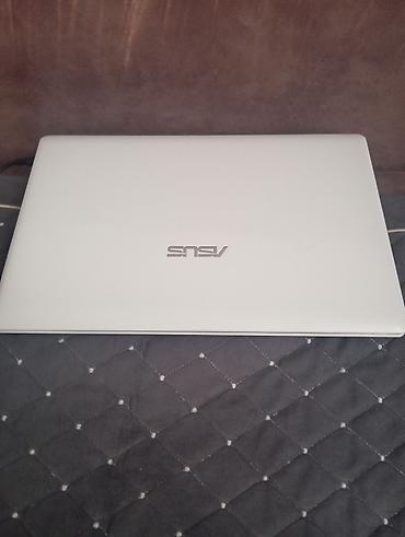 asus x509jb ej010: ASUS noutbuk – 15.6" ekranlı, ağ korpuslu model. Klaviaturası tam — 3