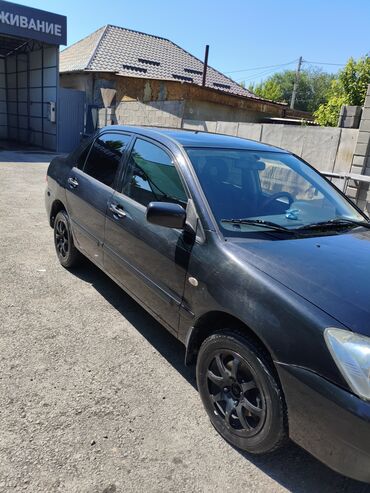 я ищу лада приора: Mitsubishi Lancer: 2005 г., 1.3 л, Механика, Бензин, Седан