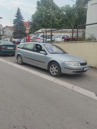 pantalone sive: Renault Laguna: 1.9 l | 2001 year | 235000 km. Limousine