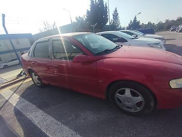Opel: Opel Vectra B, qırmızı rəng, sedan/götürmə tipli kuzov (5 qapı) — 2