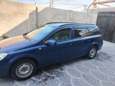 Opel: Opel Astra H Caravan (universal), göy rəng. - Kuzov: universal — 2