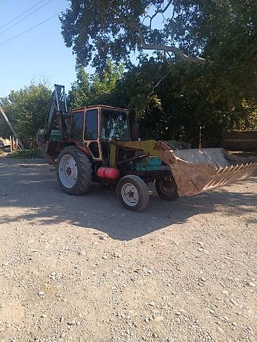 Kommersiya nəqliyyat vasitələri: Ekskavator-yükləyici traktor - Ön hissədə iri yükləmə kovası, arxa — 8
