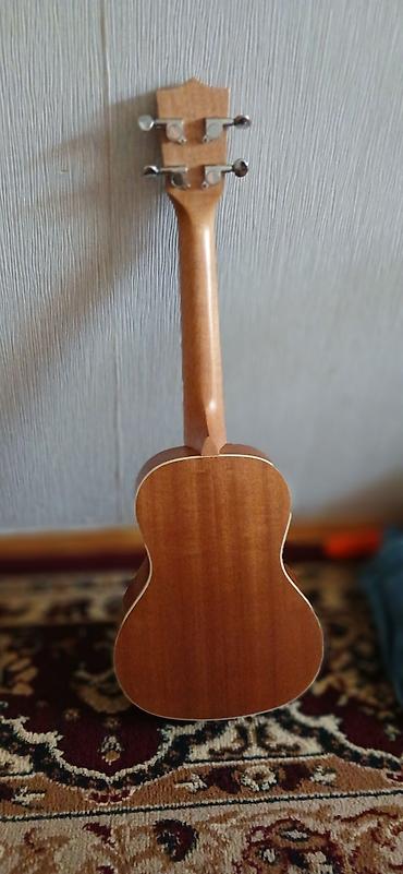 ukulele gitar: Ukulele – sopran ölçü - Korpus: təbii ağac örtüklü,o rezonans deşik — 4
