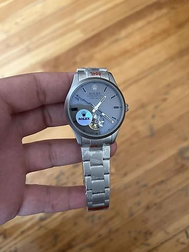 electron saat: Məhsul: Mexaniki qol saatı (Rolex üslubunda dizayn) Xüsusiyyətlər: - — 2
