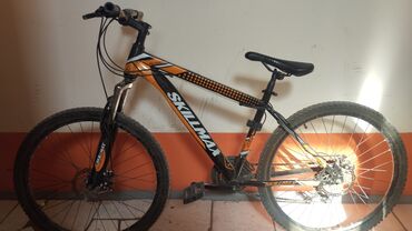 велосипед оранжевый: Продам велосипед от фирмы skillmax состояние: средние размер калес:26