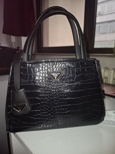 ysl torbe cena: Elegantna torbica, Prada