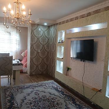 bina az əmircan: Seherin merkezinde 4 mertebeli binanon 3 cu mertebesi 3 otagli ev — 9