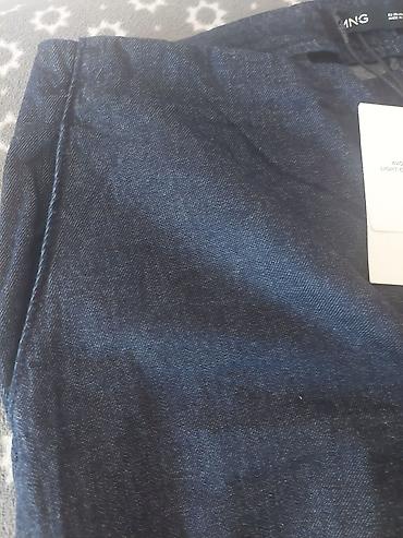 yassa jakne: MANGO ženske pantalone od tamnog denima, širokog kroja.Velicina M - — 3
