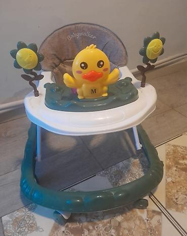 uşaq gəzdirən: Uşaq gəzdirəni (baby walker) - Oturacaqlı, bel dayaqlı model – arxada — 1