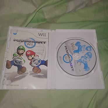 disqler: Mario Kart Wii – orijinal Nintendo Wii oyunu (PAL versiyası) Məzmun — 4