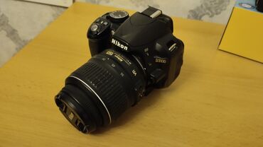 nikon d5200: Nikon D3100 (çox az istifade olunub. Çanta, ştativ, elave 1 bateriya