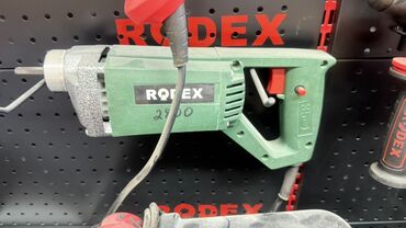 лазерный уровень строительный: Зеленая электрическая дрель Rotex 2100 для сверления отверстий в