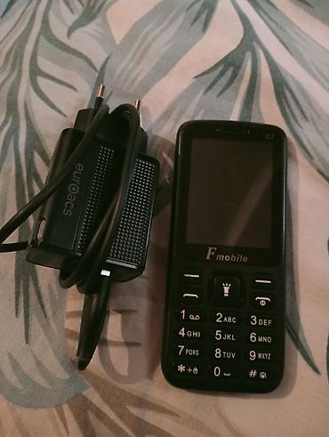 dinamika: Fmobile C7 düyməli mobil telefon - Kompakt korpus, fiziki 12 düyməli — 1