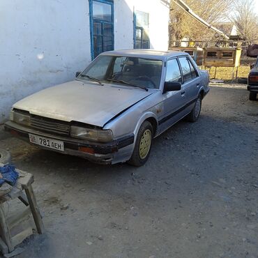 Mazda: Mazda 2: 1987 г., 2 л, Механика, Газ, Седан — 1